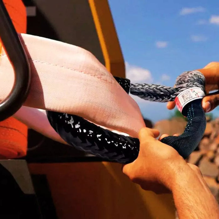 Towing Strap with a soft Shackle on a haul truck